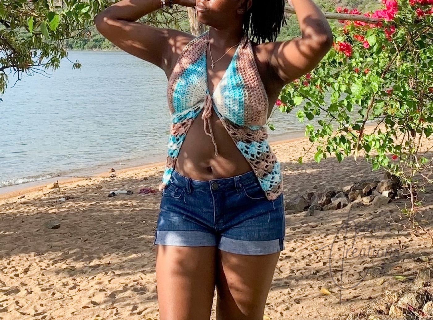 Colourful crochet halter top worn at the beach