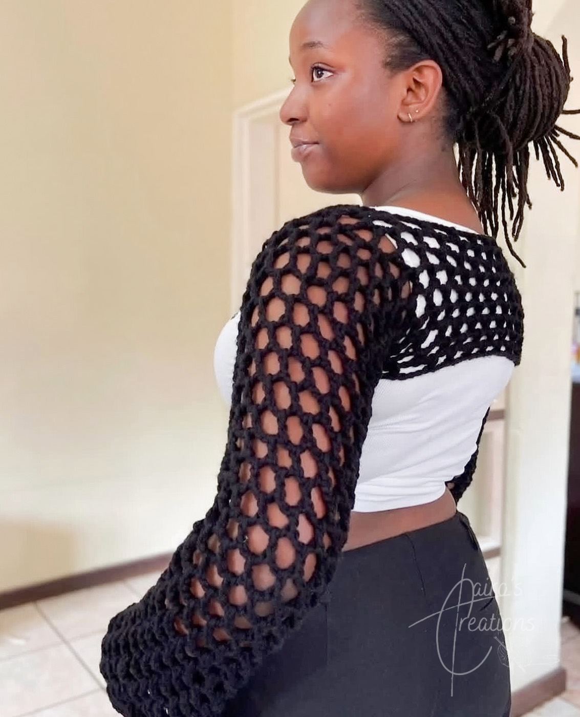 Black open-mesh crochet shrug with long sleeves, worn, earthy girl needs,